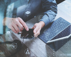 Man,hand,using,voip,headset,with,digital,tablet,computer,docking